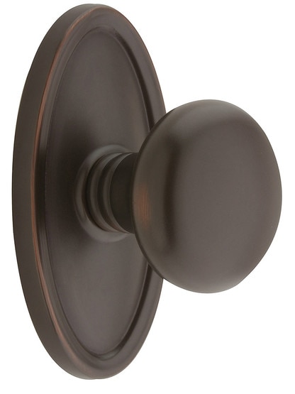 Oval Rosette Set With Providence Knobs in Oil Rubbed Bronze.